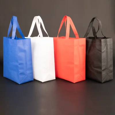 Bolsa TNT reutilizable "SAUL" con costuras termoselladas, asas 38 x 2.5 cm. - Regalos Corporativos