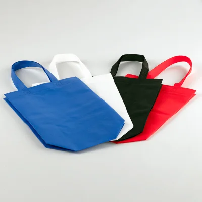 Bolsa TNT reutilizable "SAUL" con costuras termoselladas, asas 38 x 2.5 cm. - Regalos Corporativos